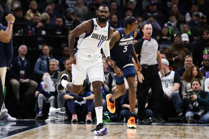 Mavs' Tim Hardaway Jr. reacts to scoring against the Minnesota Timberwolves.